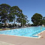 Workers Retreat Across From Essendon Station