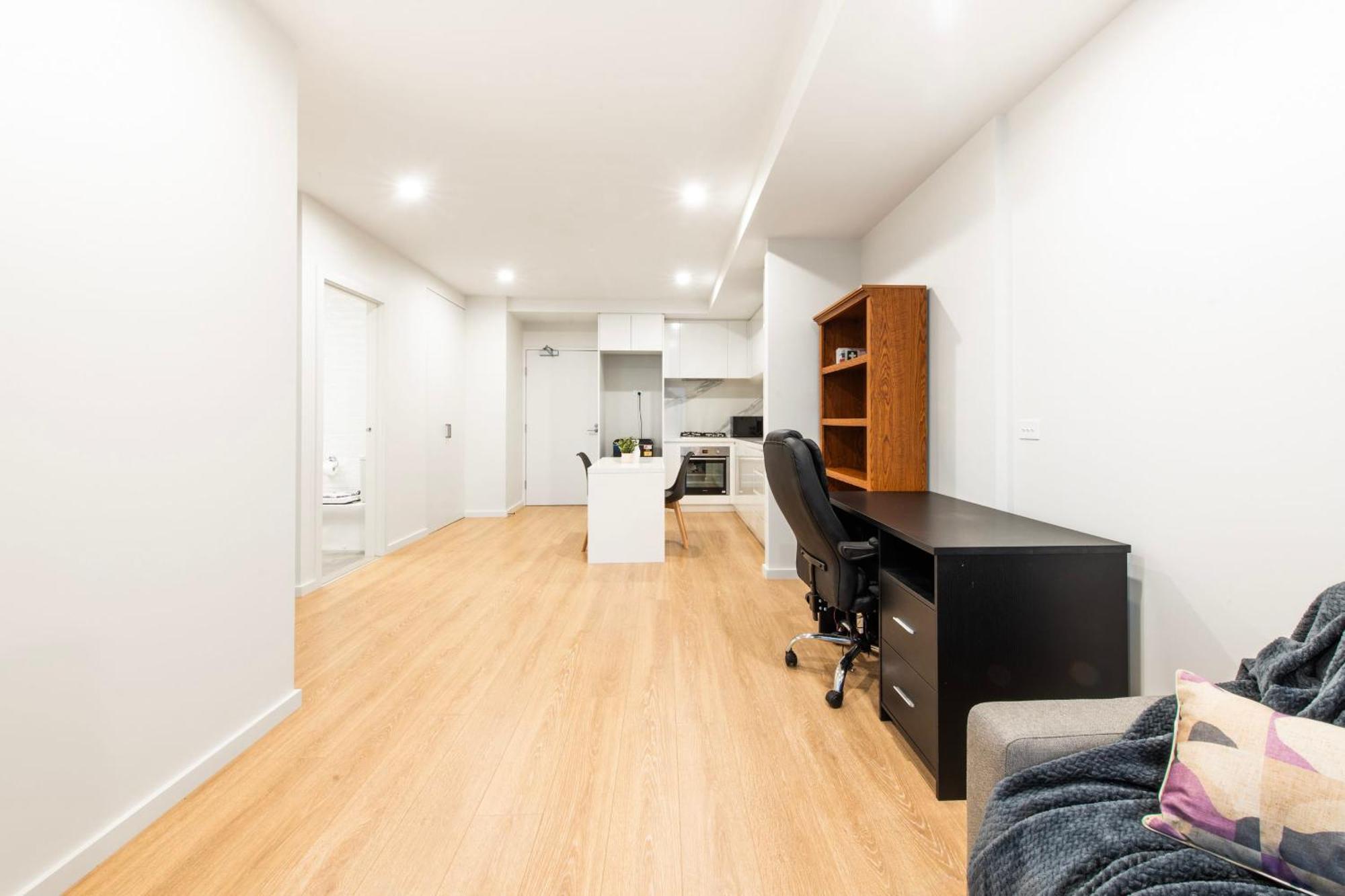 Workers Retreat Across From Essendon Station