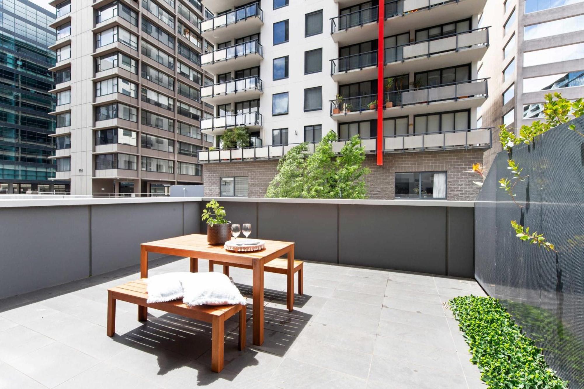 A Chic With A Large Balcony Next To Grand Prix